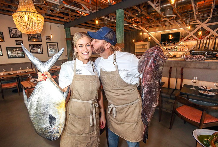 Janine Booth and Jeffrey McInnis with two fishes